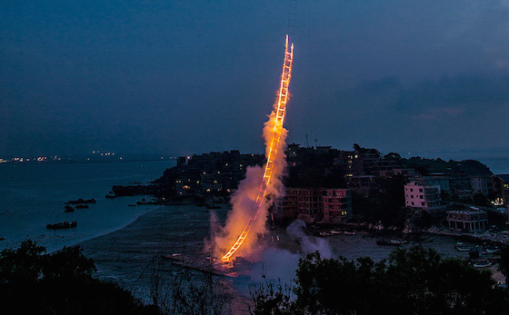 Off the shore of huiyu island — a small and picturesque fishing village the chinese city of quanzhou — artist Cai Guo-Qiang has realized the explosion event ‘sky ladder’ in his hometown, a project he has attempted three times over the past 21 years. Finally completed in Quanzhou, ‘sky ladder’ was offered as a gift for the artist’s 100-year old grandmother, his parents, family, and hometown.  