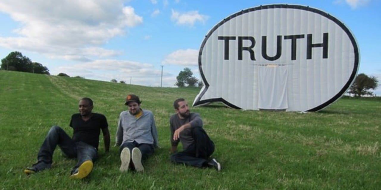 Cause Collective is the artist group behind The Truth Booth. (Left to right) Hank Willis Thomas, Jim Ricks and Ryan Alexiev. (Not pictured: Will Sylvester)